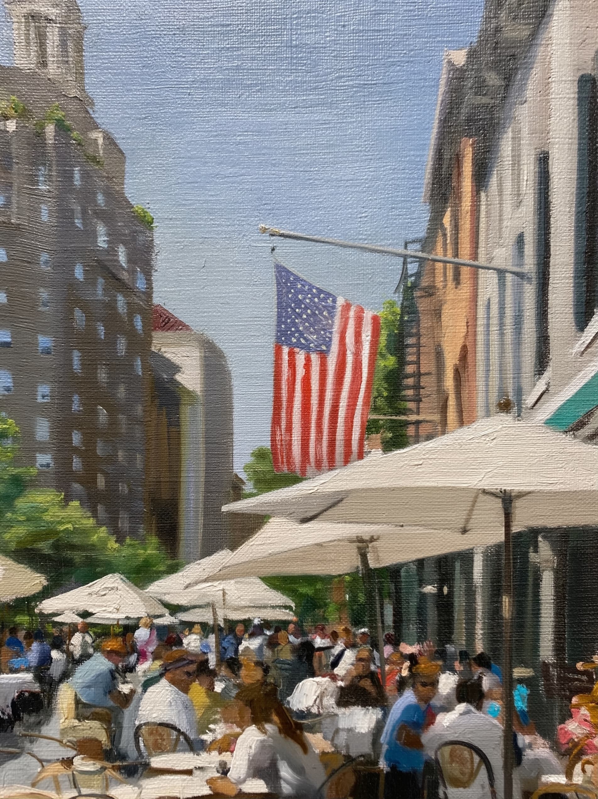 Oil painting of a lively city street with pedestrians and American flag